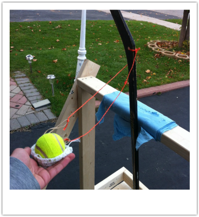 slingshot tennis ball launcher